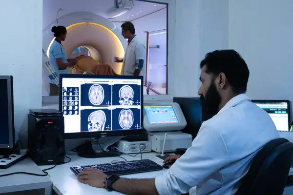 Image of a patient taking a MRI scan at Believers Hospital